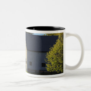 Barn on thoroughbred horse farm at sunrise, Two-Tone coffee mug