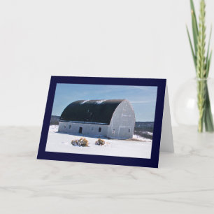Barn with curved roof in snow card
