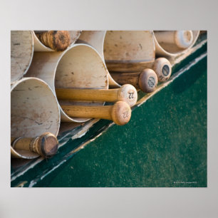 Baseball bats in the dugout poster