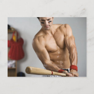 Baseball player with bare chest warming up with postcard