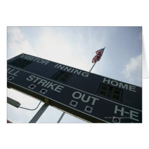 Baseball scoreboard with American flag