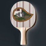 Basil the Pig Ping Pong Paddle<br><div class="desc">Basil the pot-bellied pig is a good natured paisley shaped friend who loves sniffing around the back yard for scattered pieces of air popped popcorn,  his favourite treat.</div>