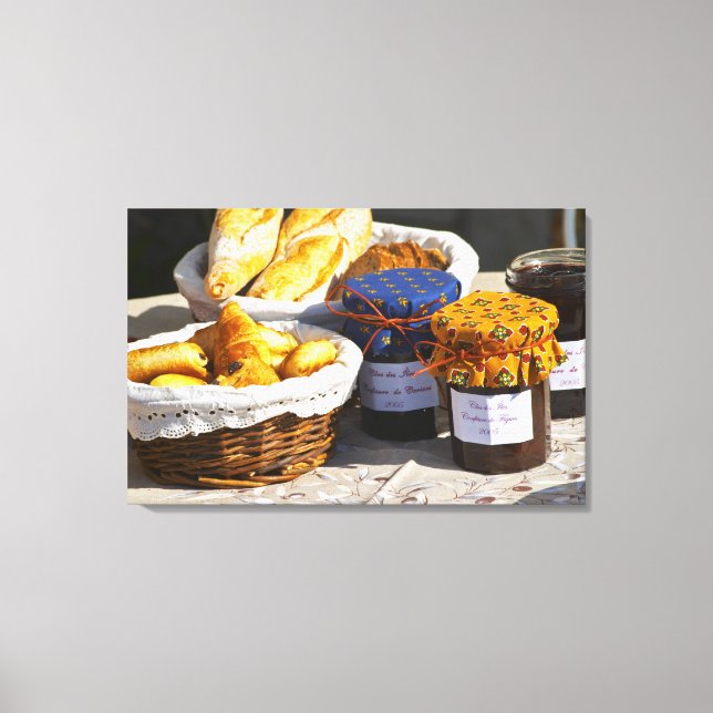 Basket with croissants and chocolate breads. canvas print (Front)
