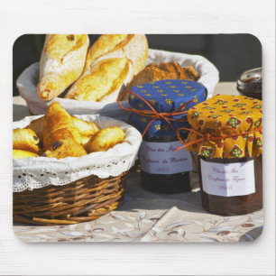 Basket with croissants and chocolate breads. mouse mat