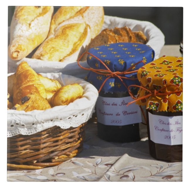 Basket with croissants and chocolate breads. tile (Front)