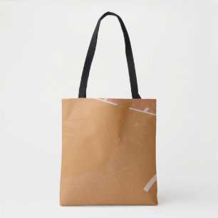 Basketball hoop casting shadow on line tote bag
