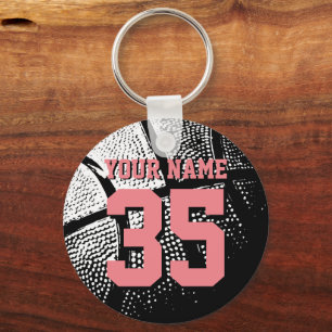 Basketball key chain with coral pink jersey number
