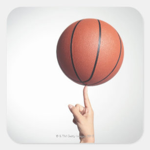Basketball on index finger,hands close-up square sticker