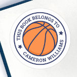 Basketball this book belongs to school name classic round sticker<br><div class="desc">Basketball book labels featuring a basketball at the centre and customisable text "this book belongs to" and your name in a college sports style font. All colours are customisable in the design tool.</div>