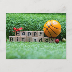Basketballs with happy birthday word is on green postcard