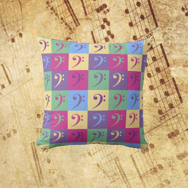 Bass Clef Music Pattern Bright Cushion (A throw pillow with a colorful pattern of bass clef symbols.)