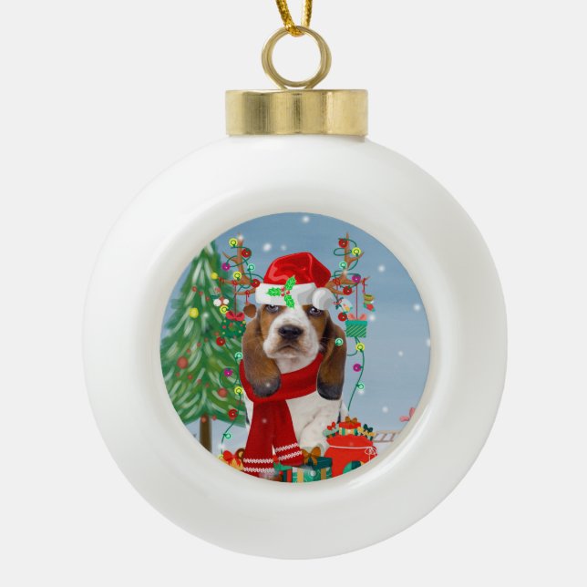 Basset Hound Dog in Snow with Christmas Gifts Ceramic Ball Christmas Ornament (Front)