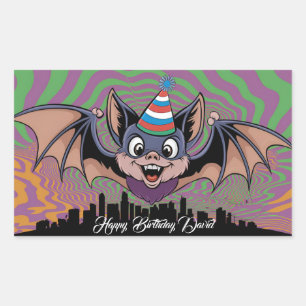 Bat flying above psychedelic city rectangular sticker