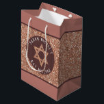 Bat Mitzvah Rose Gold Magen David Personalised Medium Gift Bag<br><div class="desc">Once personalised, this stylish faux rose gold glitter gift bag with a matching Magen David star and your text will be the perfect touch for your Bat Mitzvah gift. Set on an allover background of faux glitter, the faux sparkle Star of David is centred on a circle of deep mauve...</div>