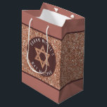 Bat Mitzvah Rose Gold Magen David Personalised Medium Gift Bag<br><div class="desc">Once personalised, this stylish faux rose gold glitter gift bag with a matching Magen David star and your text will be the perfect touch for your Bat Mitzvah gift. Set on an allover background of faux glitter, the faux sparkle Star of David is centred on a circle of deep mauve...</div>