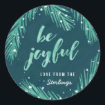 Be Joyful Christmas Sticker | Snow & Pines<br><div class="desc">Hand-drawn pine branches in soft green watercolor paired with calligraphic "be joyful" typography against a textured dark blue background makes for a bright and modern holiday design.</div>
