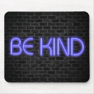 BE KIND text in neon lights on brick Mouse Mat