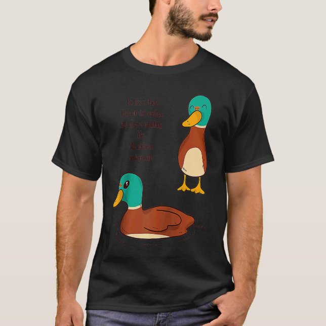 Be like a duck Calm on the surface but always padd T-Shirt (Front)