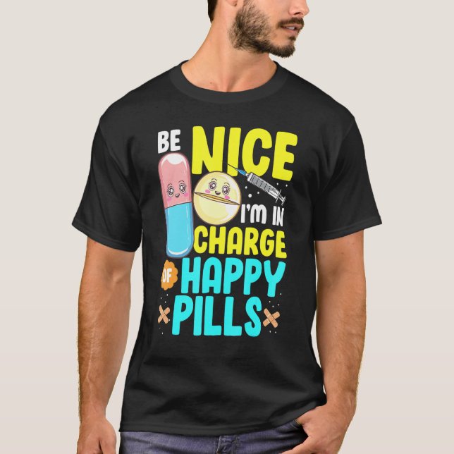 Be Nice Im In Charge Of Happy Pills Nursing Tee Nu (Front)