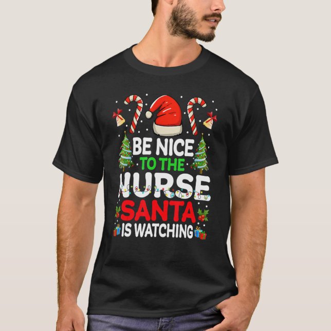 Be Nice To   Nurse Xmas Pajama Santa Is Watching T-Shirt (Front)