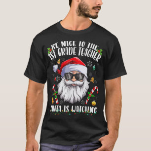 Be Nice To The 1st Grade Teacher Santa Is Watching T-Shirt