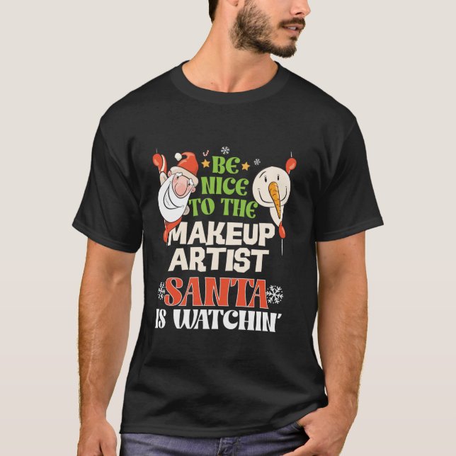 Be Nice To The Makeup Artist Santa Watching Funny  T-Shirt (Front)