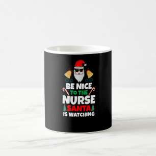 Be Nice To The Nurse Santa Is Watching Coffee Mug