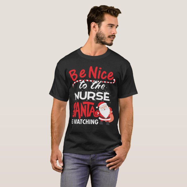 Be Nice To The Nurse Santa Is Watching Funny Nurse T-Shirt (Front Full)