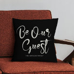 Be Our guest Custom Text Family Modern Black Cushion<br><div class="desc">Modern trendy script calligraphy reading "Be our guest" on this elegant back and ivory throw pillow,  perfect to welcome guests to your home,  vacation rental,  or bed and breakfast.</div>