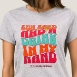 Beach Bachelorette Party Groovy Sun Sand Drink T-Shirt<br><div class="desc">Make a splash at your upcoming bachelorette party with this stunning beach bachelorette party personalised t-shirts. Whether you're celebrating a bach trip, a girls' vacation, or a best friends' holiday, this custom beach bachelorette party t-shirts are the perfect addition to your unforgettable getaway. Add a personal touch to your bachelorette...</div>