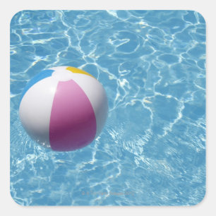 Beach ball in swimming pool square sticker