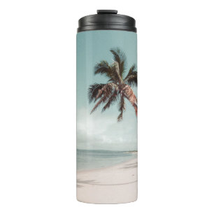 Beach beside coconut palm tree thermal tumbler