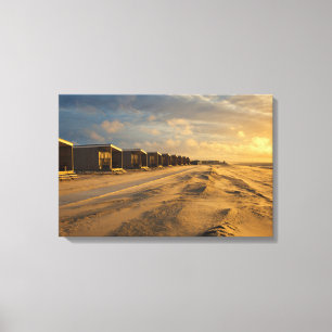 Beach cabins at sunset at the dutch coast canvas print