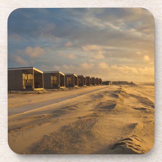 Beach cabins at sunset at the dutch coast coaster (Front)