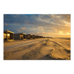 Beach cabins at sunset at the dutch coast photo print