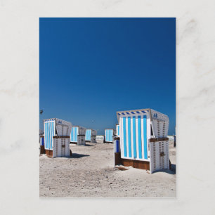 Beach chairs on shore of the Baltic Sea Postcard