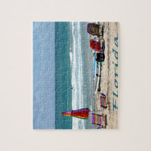 beach chairs surfboards umbrellas sand ocean jigsaw puzzle