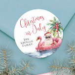 Beach Christmas In July Classic Round Sticker<br><div class="desc">Celebrate the season with this festive and playful round sticker design, perfect for a sunny Christmas in July gathering. The artwork features a laid-back Santa Claus in sunglasses lounging in a pink flamingo floaty, surrounded by ocean waves and tropical vibes—bringing a cheerful twist to your warm-weather celebration. "Christmas In July"...</div>