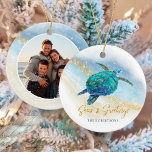 Beach Coastal Sea Turtle Seas and Greetings Photo Ceramic Tree Decoration<br><div class="desc">This Hawaiian tropical coastal themed holiday ornament is easily personalised with family name on the front and a photo on the back, and features a watercolor turquoise blue sea turtle on an abstract beach background with a faux gold glitter sparkly wave, and gold Seas & Greetings. Check out the collection...</div>