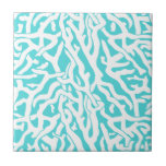 Beach Coral Reef Pattern Nautical White Blue Tile<br><div class="desc">This pretty ocean / beach-inspired repeating nautical pattern looks like an intricately-woven coral reef in white on a beachy - blue background. The elegant coral reef pattern is done in a stencil look. The colour of blue is reminiscent of bright, clear tropical seas. This simple, modern design is perfect for...</div>