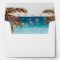 beach design with palm trees lined envelopes