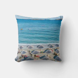 Beach lounge on seashore facing the sea cushion