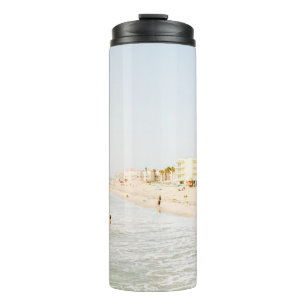 Beach near building at daytime thermal tumbler
