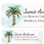Beach Return Address Labels | Christmas Palm Tree<br><div class="desc">A chic watercolor palm tree wrapped with Christmas lights adorn these beach return address labels. Light blue watercolor splashes accent the background.  Personalised with your name and address.  Attach to your envelopes to send out coastal holiday cheer to your loved ones.</div>
