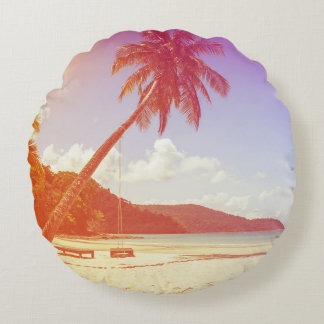 Beach scene, coconut tree, wooden bed. round cushion