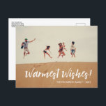 Beach themed Christmas Warmest Wishes Family Photo Holiday Postcard<br><div class="desc">Capture the warmth and joy of a beach-themed Christmas with this customised holiday postcard. Whether you're celebrating in a tropical paradise or simply longing for warmer days, this design is perfect for sending warmest wishes to your family and friends. Personalise the postcard by adding your family name and the current...</div>