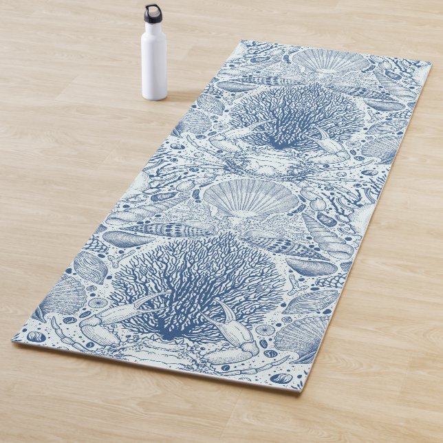 Beach treasures in blue yoga mat (In Situ)