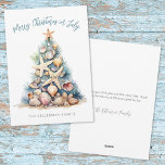 Beach Tree Christmas In July Holiday Card<br><div class="desc">Get into the holiday spirit with this unique Christmas card featuring a Christmas tree made of shells and starfish. Merry Christmas in July is playfully displayed at the top, setting the tone for a sunny, off-season celebration. Perfect for sending beachy holiday wishes, this card is ideal for anyone living in...</div>