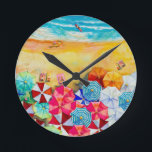 Beach Umbrellas  Round Clock<br><div class="desc">Waves on a sandy beach,  sunbathers under colourful umbrellas,  this clock is a fun addition to your beach house or summer decor or give as a gift. MATCHING items in our store.</div>