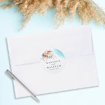 Beach Wedding Classic Round Sticker<br><div class="desc">Add a stylish touch to your wedding favours with this Elegant Beach Wedding Classic Round Sticker, perfect for a destination summer celebration. Featuring a soft blue, teal, and peach watercolor design with delicate floral accents, it blends modern boho charm with timeless elegance. Ideal for sealing envelopes or decorating gifts, this...</div>
